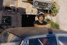 Σε έναν παλιό στάβλο στο Κορωπί, γεμάτο με κλασικές μοτοσυκλέτες και αυτοκίνητα που σώθηκαν