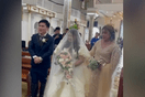 Ο τυφώνας δεν σταμάτησε τον γάμο: Νύφη περπατά σε πλημμυρισμένη εκκλησία