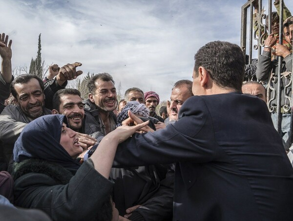 Ο Άσαντ οδηγεί προς την ισοπεδωμένη Γούτα σε μια επίδειξη νίκης