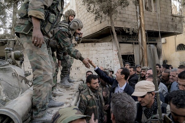 Ο Άσαντ οδηγεί προς την ισοπεδωμένη Γούτα σε μια επίδειξη νίκης
